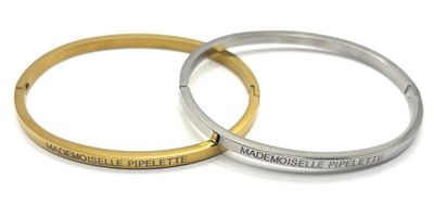 2 bracelets rigides en métal doré et argenté avec inscriptio…
