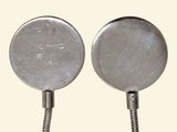 two metal objects that are connected to each other