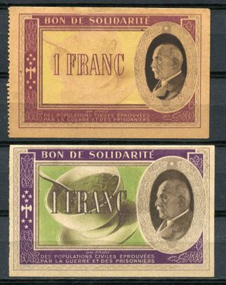 two different types of french currency on a wooden surface