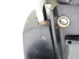 a close up of an old camera on a tripod