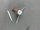 a picture of a clock with a wooden handle and a white clock face