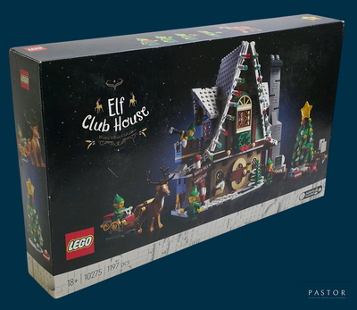 une boîte contenant une maison de Noël en Lego