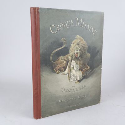 un vieux livre avec une image représentant un lion et un chat