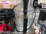 a blender sitting on top of a counter next to other kitchen appliances