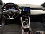 a picture of the interior of a car with a steering wheel