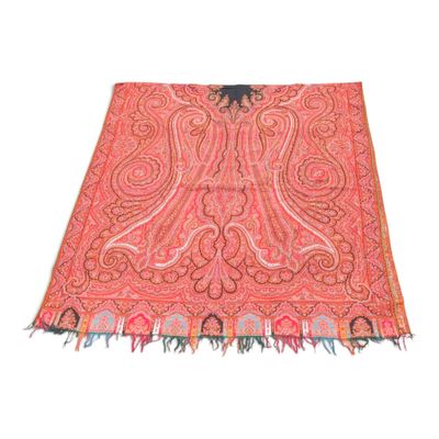 a close up of a pink and orange scarf on a white background