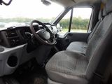 a view of the inside of a van from the driver ' s seat