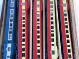 a box that has a bunch of toy trains in it