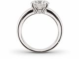 a close up of a diamond ring on a white background