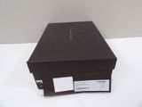 a brown box with a label on it sitting on a table
