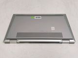 a laptop that has a sticker on the back of it
