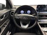 the interior of a car with a steering wheel and dashboard controls