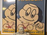 a picture of a statue of a man with a bicycle