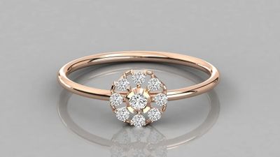 a close up of a rose cut diamond ring on a reflective surface
