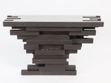 a close up of a wooden table with a white top