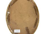 a picture of a picture of a round object on a white surface
