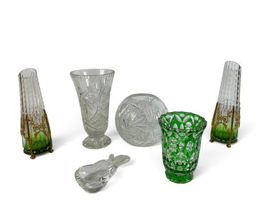 a lot of glass items that are sitting on a table