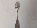 a fork that is sitting on a table