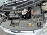 the engine of a car with its hood open and the hood open