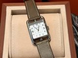 a watch that is sitting in a box on a table