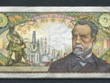 un gros plan sur l'image d'un homme figurant sur un billet de banque