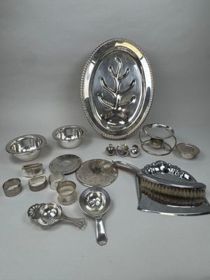 a lot of silver items that are on the table