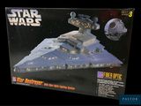the box is open to show the model of a star destroyer