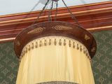 a chandelier hanging from the ceiling in a room