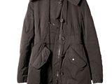 hooded parka with hood and zippers on a hanger on a white background