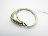 silver ring with a horse head on the side of it