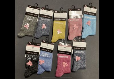 six pairs of women ' s socks with flowers on them