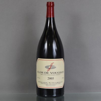 a bottle of wine that is sitting on a table