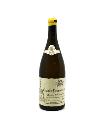 a bottle of wine that is sitting on a table