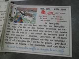 un livre ouvert sur lequel figure l'image d'un bateau