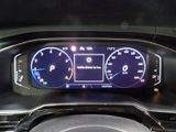 the dashboard of a car with a digital display on it