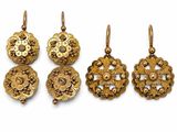 a set of five gold pendants and a pair of earrings