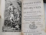 un livre sur lequel figure la photo d'une femme et d'un homme