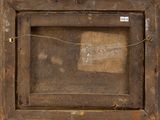 an old picture of a wooden frame with a tag on it