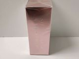 an empty pink box sitting on top of a white table