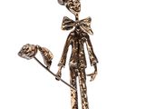 statue d'un homme muni d'une canne et d'un chapeau, tenant une fleur