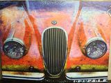 painting of an old car on a wall in a room