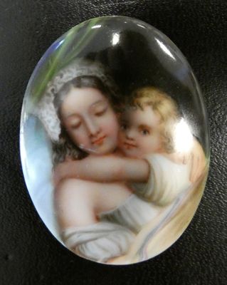 a picture of a picture of a woman and child on a plate