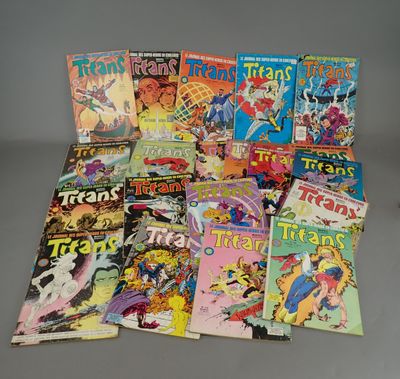 many comics are stacked on top of each other on a table