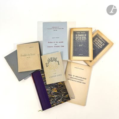 a lot of books that are sitting on a table