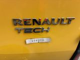 the rear end of a yellow car with the word renault tech on it