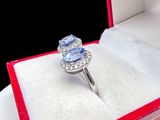 a ring that is in a red box on a table