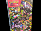 boîte du jeu de cartes à collectionner Pokémon avec l'image d'un dragon sur la couverture