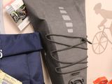 a bike bag and other items on the floor