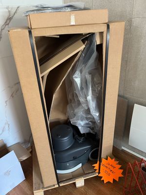 a cardboard box with a pair of shoes inside of it