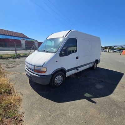 a white van parked in a parking lot